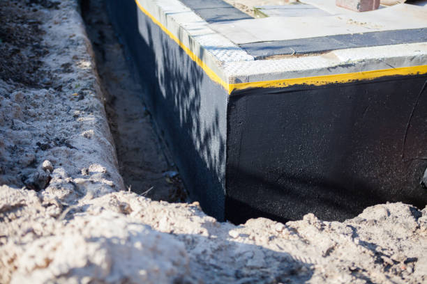 Professional Waterproofing technician working in Hartville, OH